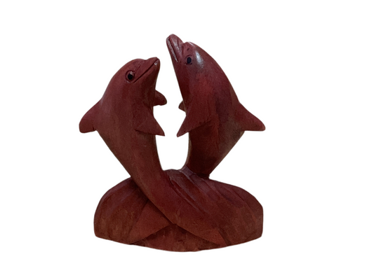 Figura de madera de delfines