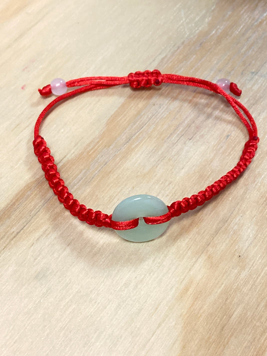 Pulsera de jade con luz de hilo rojo